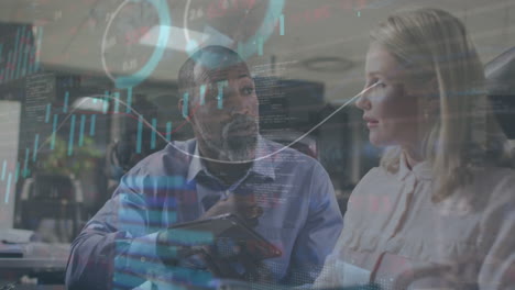 animation of graphs, loading circles and trading board over diverse coworkers discussing reports
