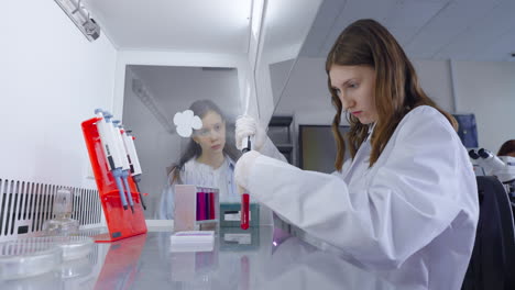 young female scientist working in a lab