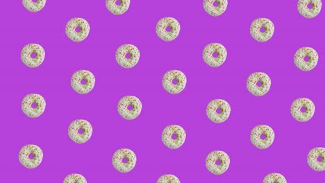 many pulsating moving glazed donuts on purple background, 3d video animation.