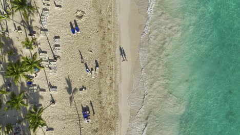 flyover drone shot above the coastline of bavaro beachfront located in an island the dominican republic located in the caribbean