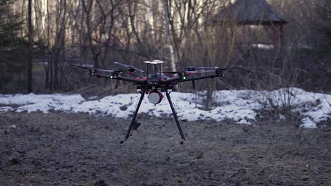 drone in a snowy forest