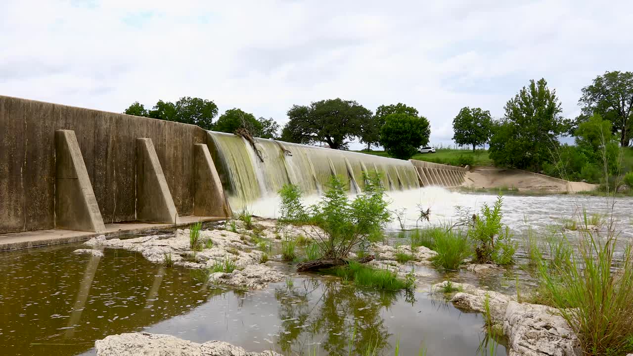 Static video of a dam on the Pedernales River in Stonewall, Texas. Recent rains caused excessive water flow