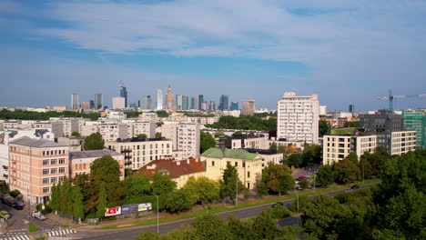 aerial view of warsaw skyline from over park in daytime, poland