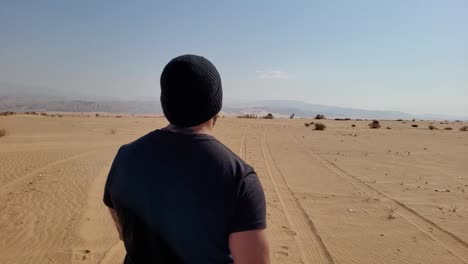 man in the desert in slomo