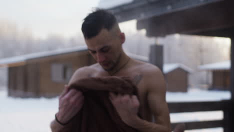 man going out of the hot tub