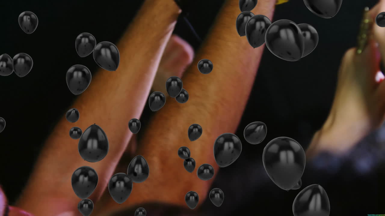Floating black bubbles over face and arms in dim lighting, creating animation