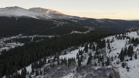 Flying-a-trail-along-the-ridgeline-of-North-Star-Mountain-with-Highway-9-and-Mt