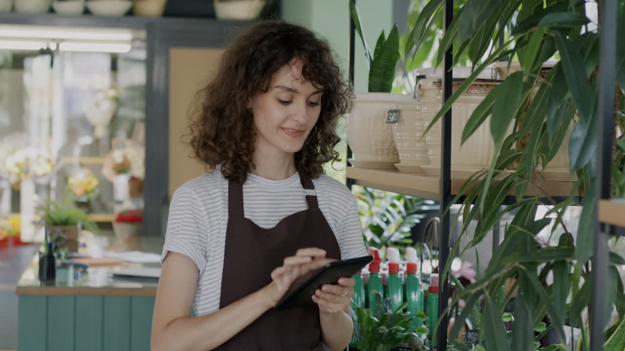 Woman working in a flower shop