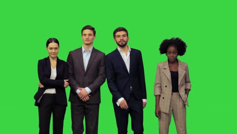 four business people meet, greet each other and shake hands on a green screen, chroma key