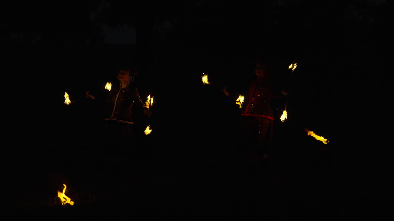Children Fire Jugglers at Night