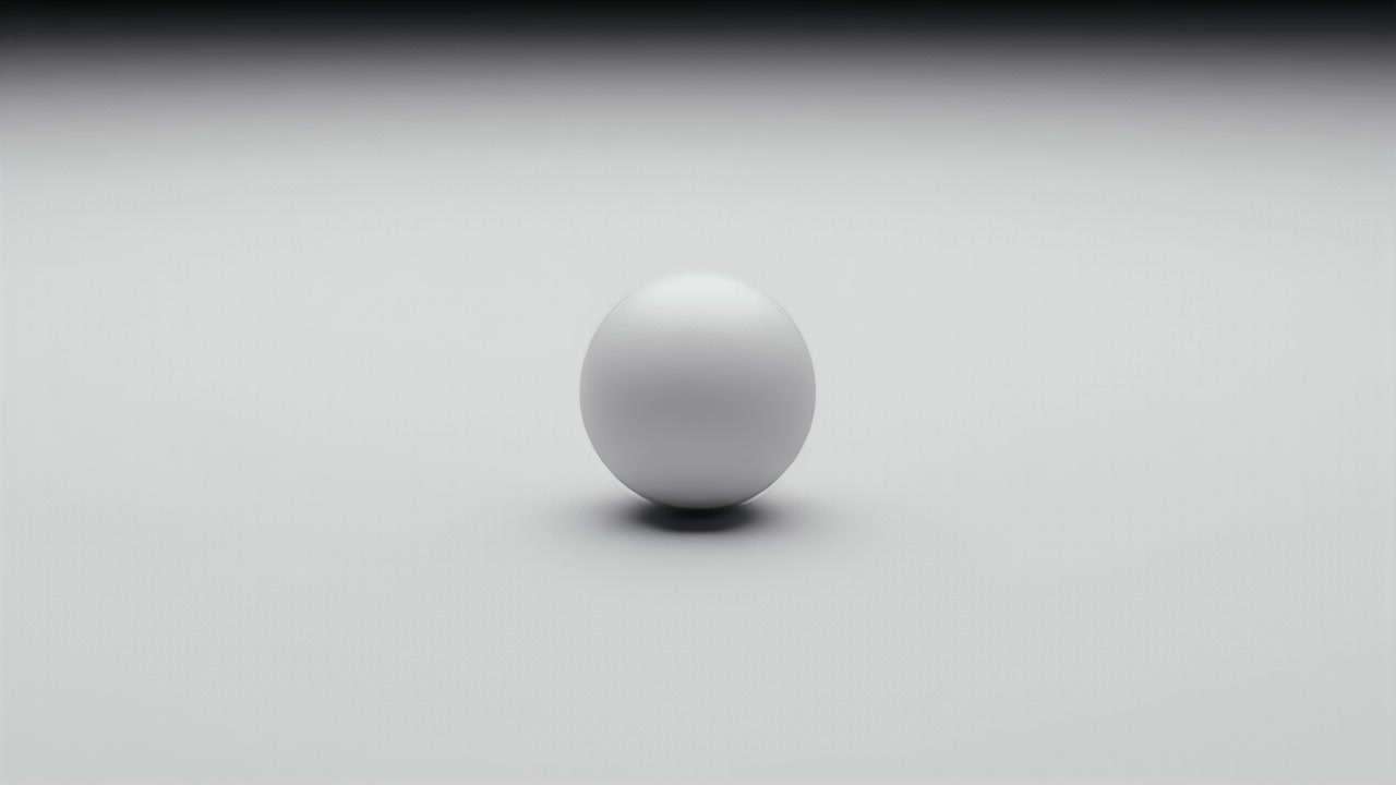 Single White Sphere Rolling Across a Clean Studio Surface