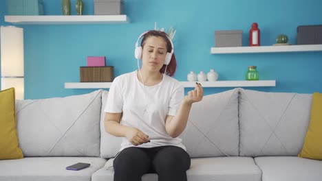 happy woman listening to music with headphones.