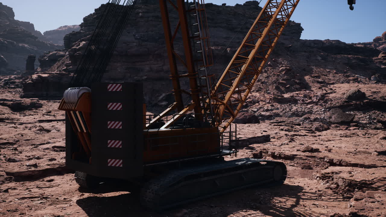 A large crane sitting on top of a dirt field
