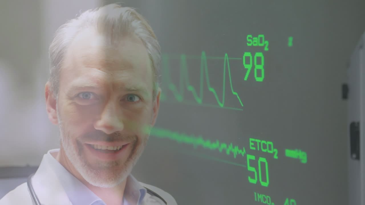 Animation of heart rate over happy caucasian male doctor