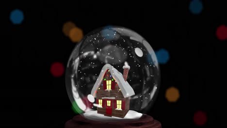Animation-of-christmas-snow-globe-with-house-over-black-background