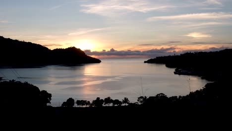 sunrise overlooking pokpok island + ocean in bougainville, papua new guinea