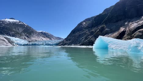 excellent shot passing an iceberg by alaska's dawes glacier