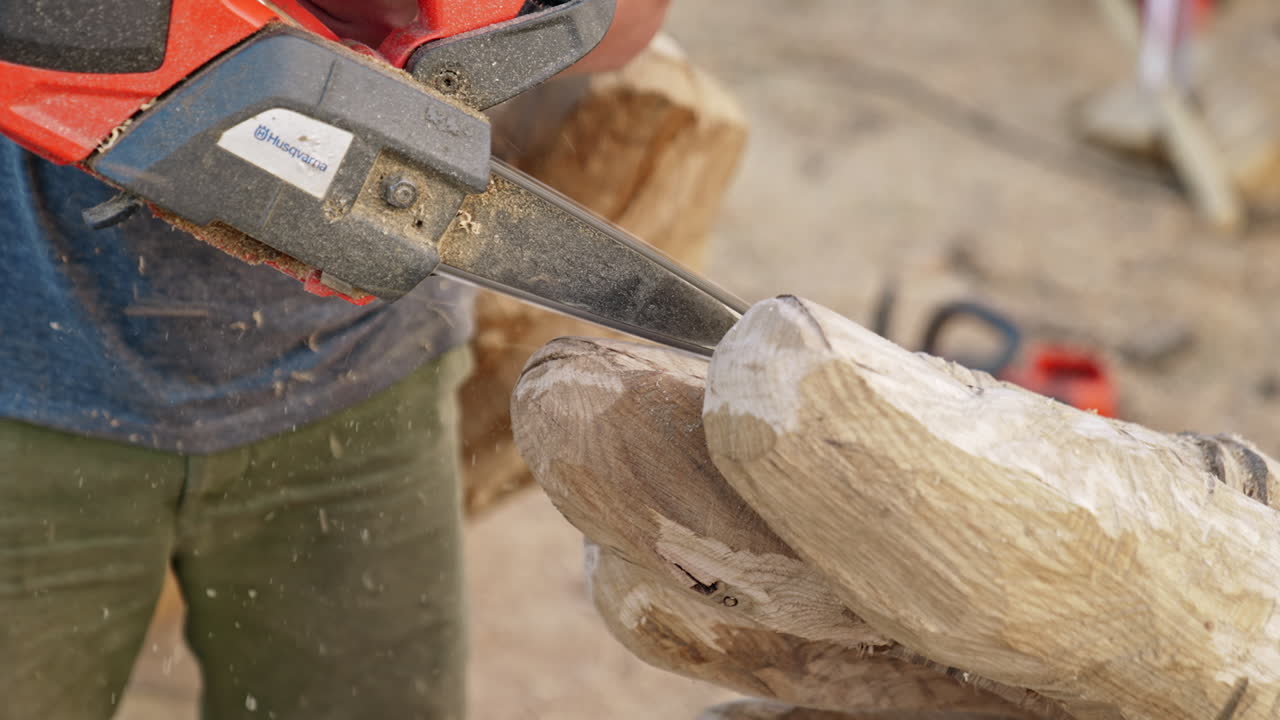 Closeup view of wood carving with chainsaw