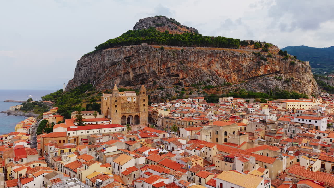 Charming views of Cefalù's historic buildings and rugged coastline