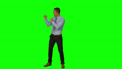 Businessman-standing-and-boxing