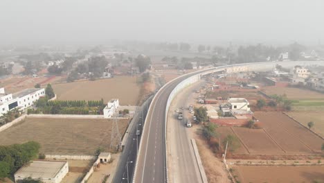 bird view of the traffic on the highway from a flyover in punjab