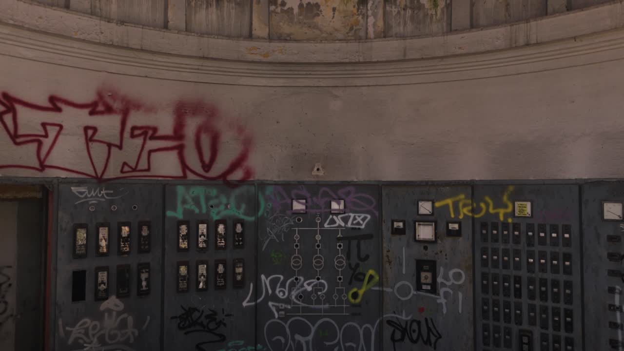 Abandoned Industrial Building with Graffiti and Stained Glass