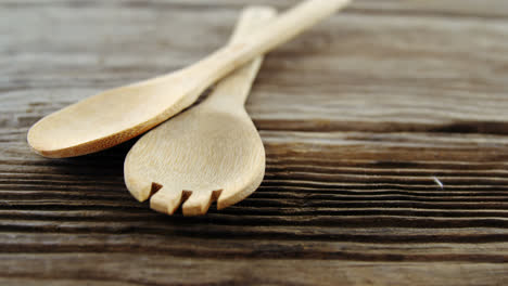 wooden spoon and fork on table