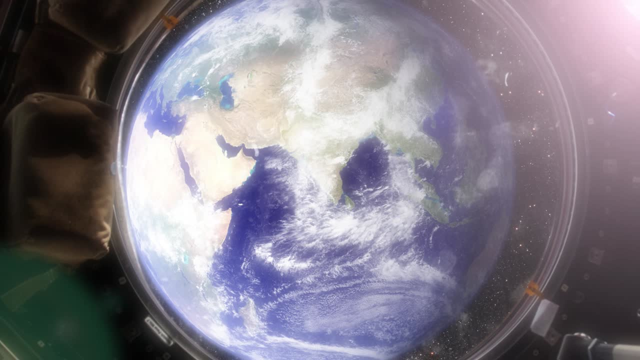 Professional, photo-realistic animation of Earth from the International Space Station. The camera slowly floats through the window out into space. Clip contains, the Earth, stars, space, space station