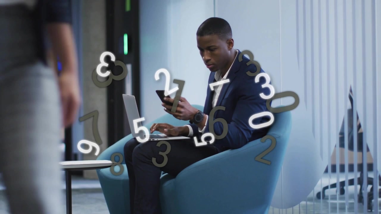 Businessman grabbing smartphone and powering laptop while generating 3D numbers for data analysis