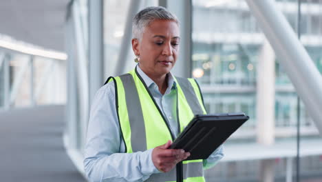 Engineering-woman,-tablet-and-walking-with-design