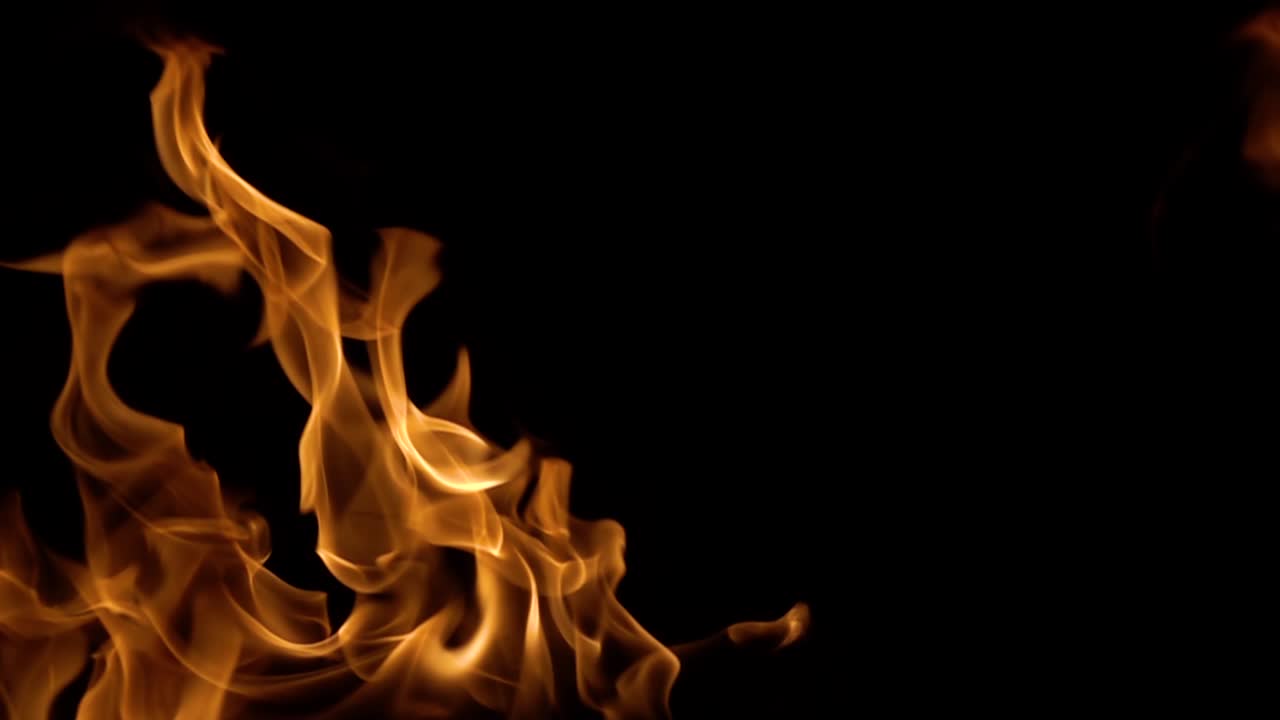 Flames of fire on black background in slow motion