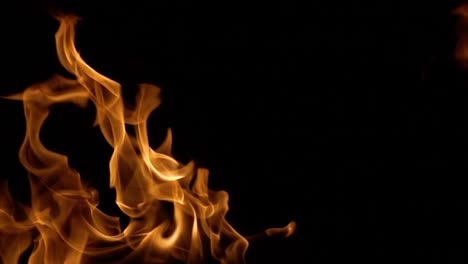 Flames-of-fire-on-black-background-in-slow-motion