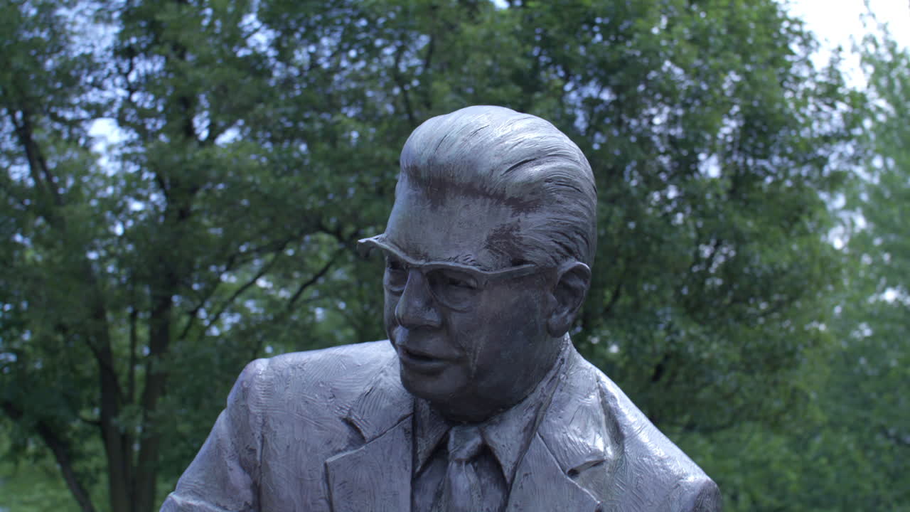 Bronze Statue of a Man in a Suit