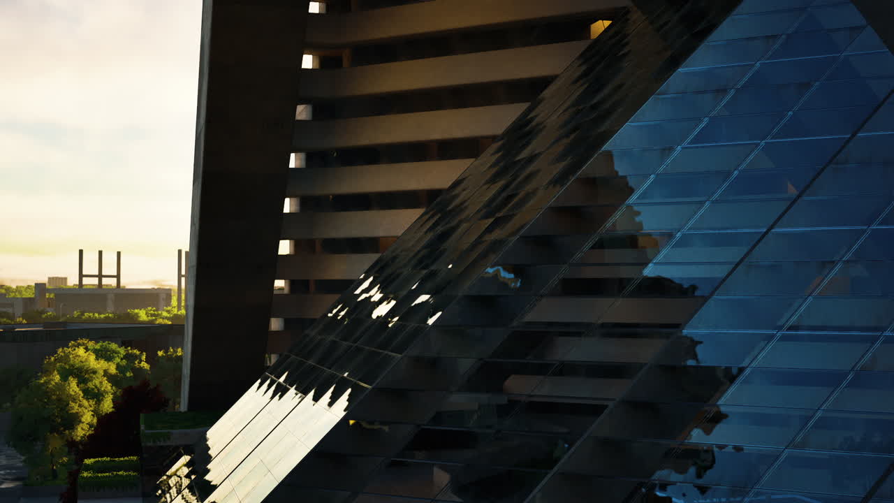 Modern architectural structures reflect sunlight in an urban setting at dawn