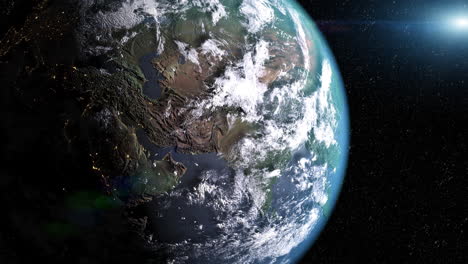 close-up of the earth from space with clouds and green landscapes