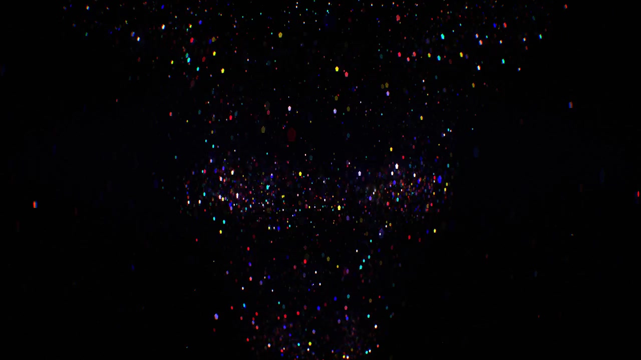 Vibrant multicolored glitter particle vortex sparkles and rotates against a deep black backdrop, loopable festive and magical atmosphere
