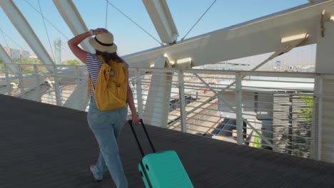 traveler walking on bright terminal bridge