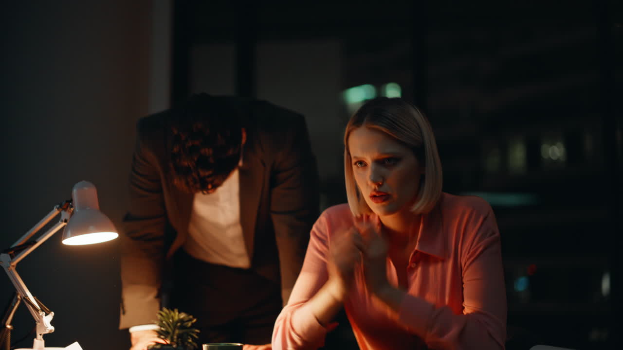 Stressed Business Team Working Late at Night