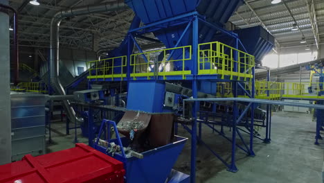 Recycling Plant Waste in A Moving Conveyors, Interior of Recycling Factory, Drone Shot in Slowmotion