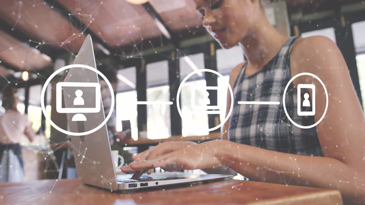 Animation of network of connections with icons over african american woman using laptop