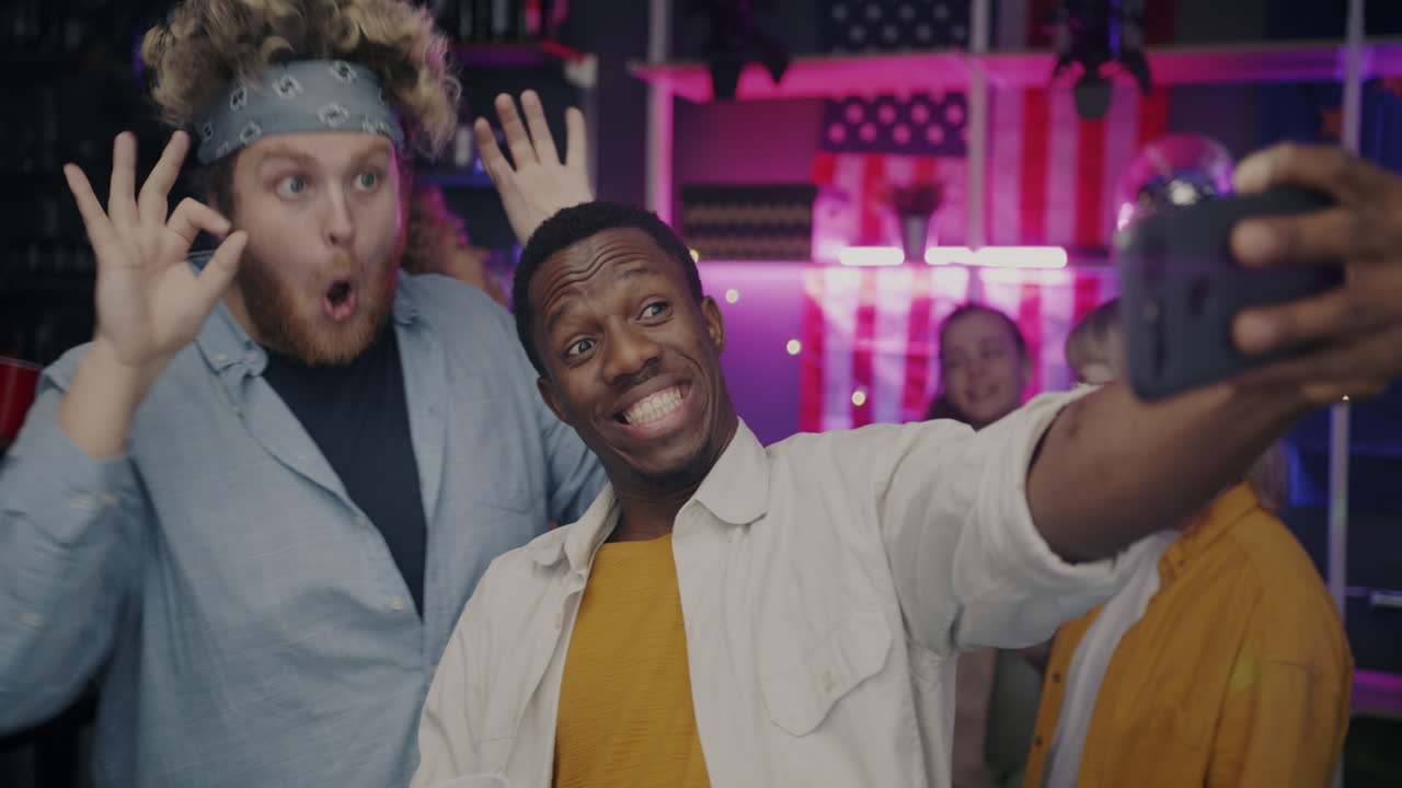 Friends Taking a Selfie at a Party