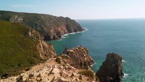 portugal, cabo da roca lookout point with the view of the rocky hillside and atlantic ocean