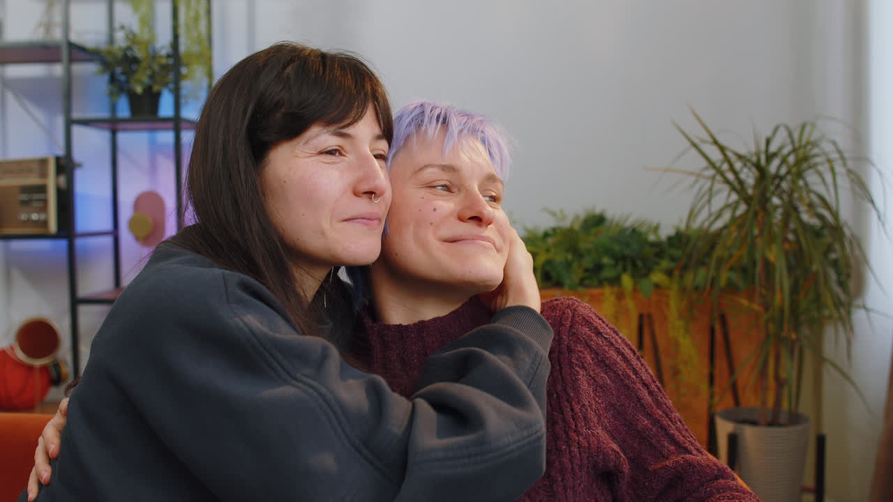 Happy lesbian women family couple smiling feel satisfied good news positive pregnancy test at home