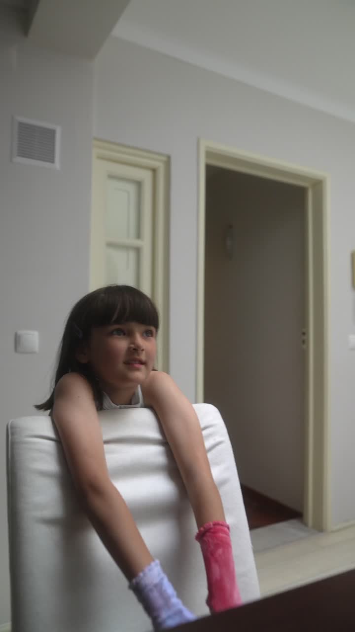 Girl with bandaged arms