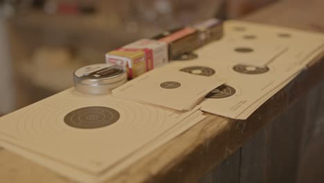 Dolly-out-of-paper-firearm-targets-and-boxes-of-ammunition