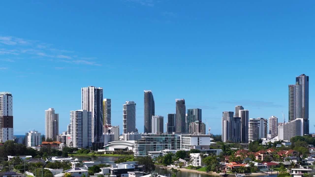 A static view of Gold Coast's skyline with modern skyscrapers against a bright blue sky, captured in daylight