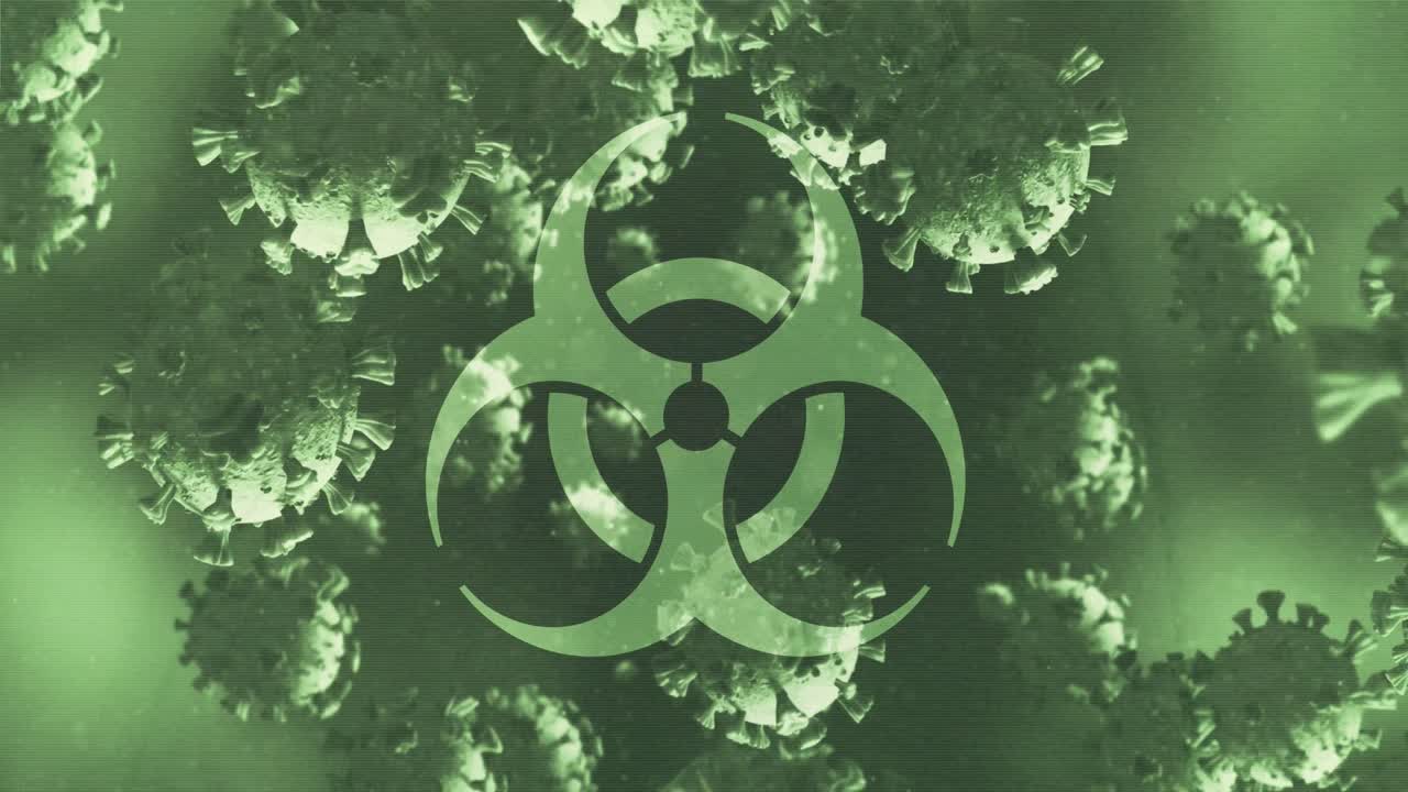 animación de las células de covid-19 sobre el símbolo de riesgo biológico