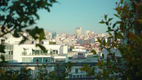 Lisbon-city-rooftop-buildings-balcony-at-morning-under-blue-sky-4K