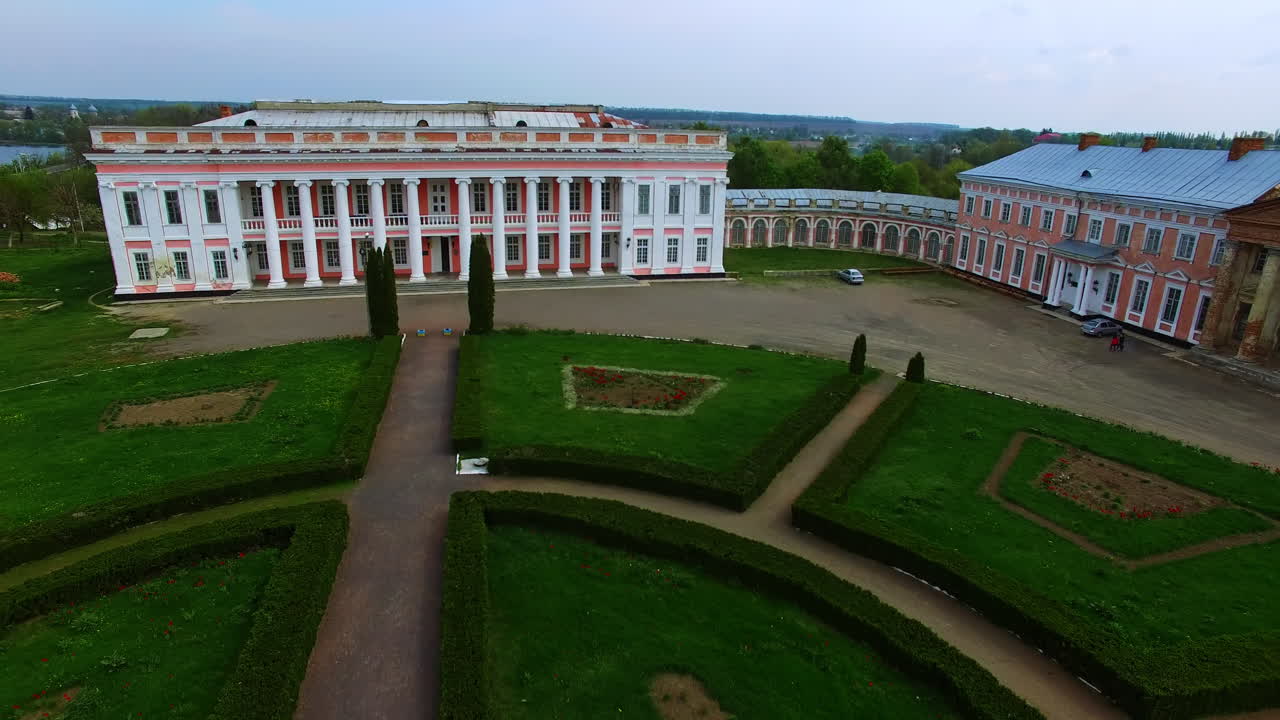 Historical residence with beautiful palaces. Little pond and provincial town scenery at backdrop. Top view.