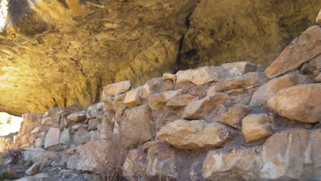 remnants of wall of cliff dwelling at walnut canyon